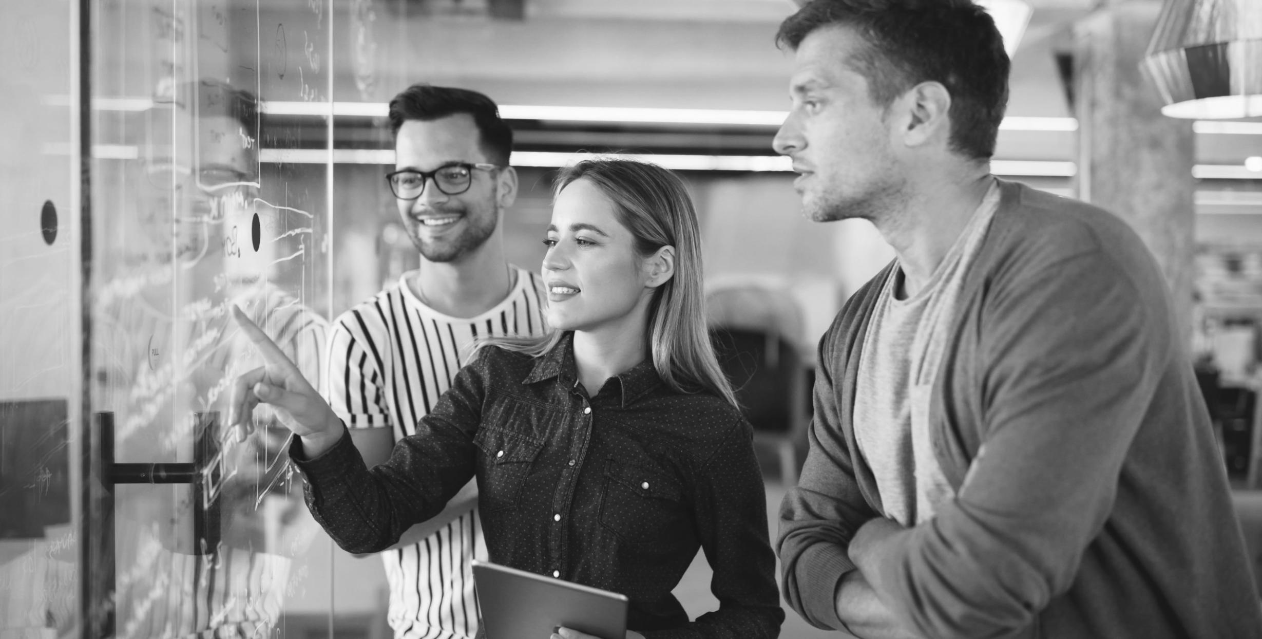 Strategic advertising planning session with marketing materials